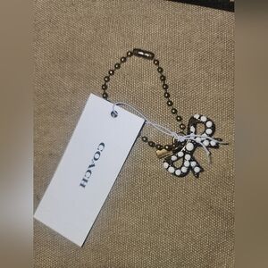 Coach New York Exclusive White Pearl Bow Shoe Charm Wristlet Wallet Purse NWT